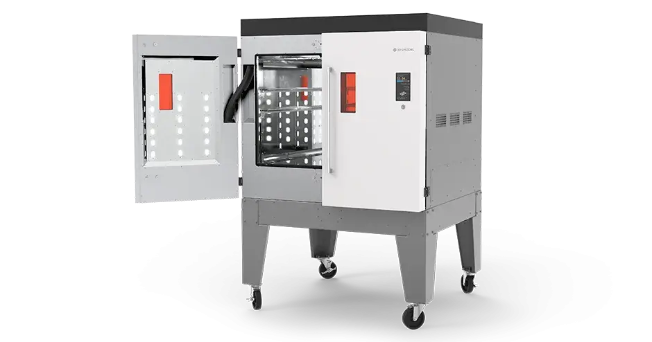 Macchina di post-elaborazione MDM con una porta socchiusa per mostrare le parti interne della macchina