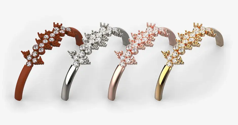 Quattro braccialetti realizzati con il materiale per fusione VisiJet Ruby